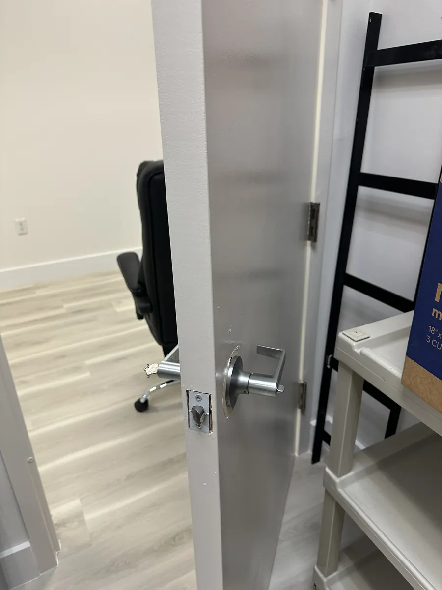 Lever lock on a white interior office door